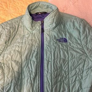 Mint green and purple Women’s North Face jacket. Great jacket and very warm.